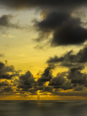 Dark Clouds And Orange Sunset Sky
