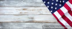Independence Day concept with USA Flag on light wooden background 0PYya5