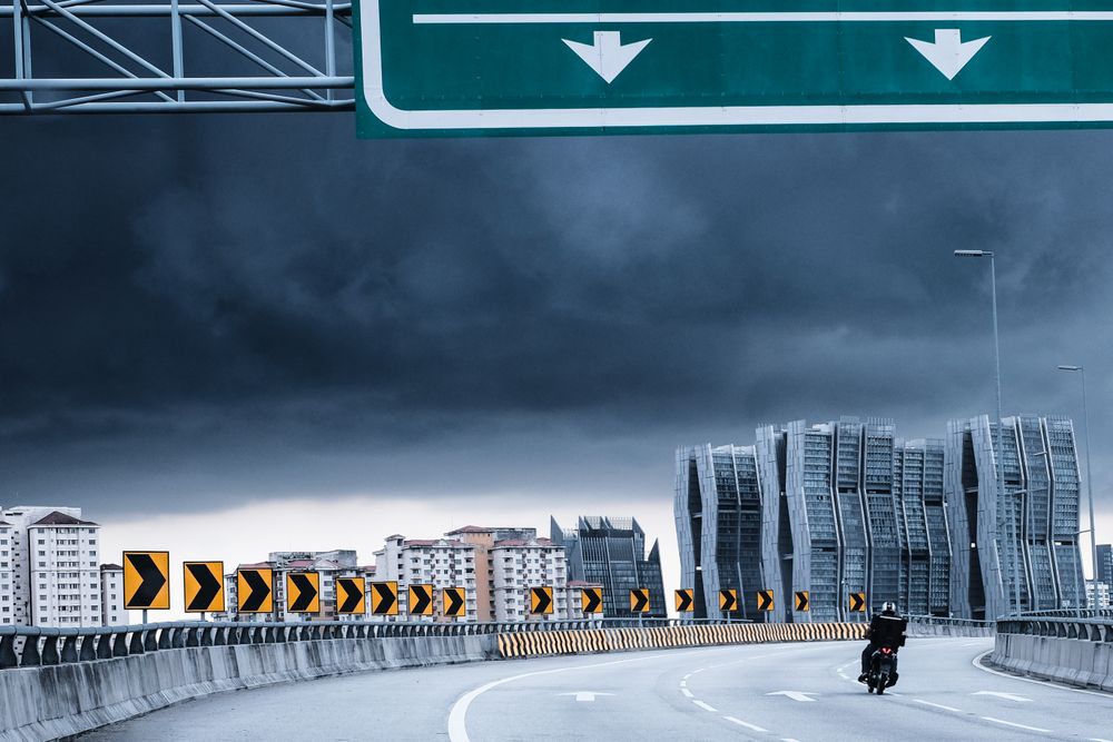 Person on motorcycle on highway