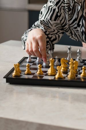 Close-up of chess piece movement
