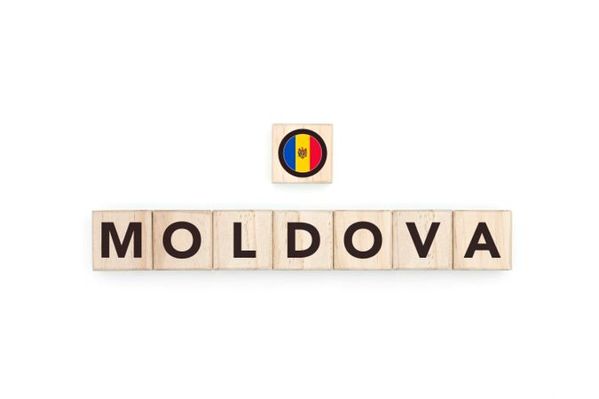 Wooden blocks bearing the name and flag of Moldova.