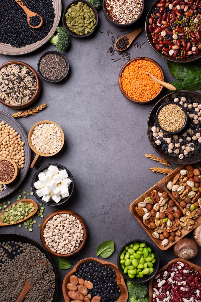 Bowls of healthy grains and vegetables, top view with copy space