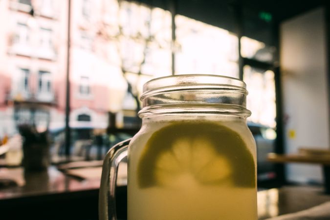 Glass cups with tasty lemonade