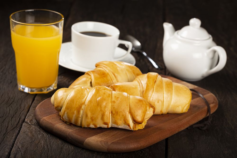 Traditional fresh baked croissants on the table.