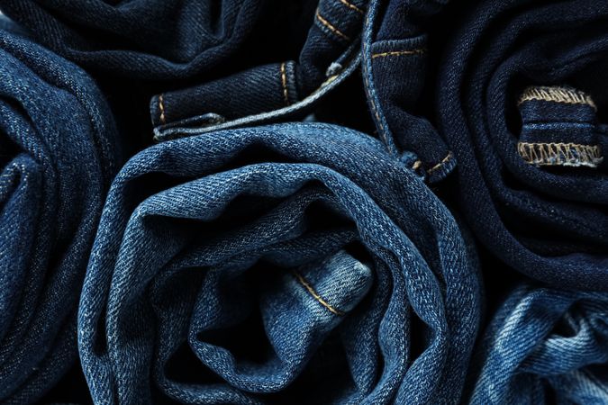 Concept of modern casual clothes - jeans, rolled jeans