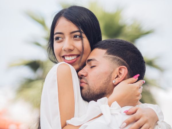 Man bonging smiling woman with love and tenderness