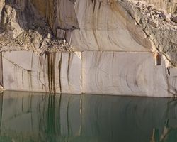 Calm water near stone quarry
