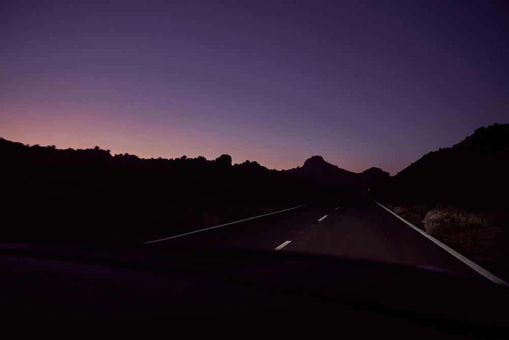 Road in nature at night time