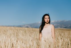 Woman standing in field