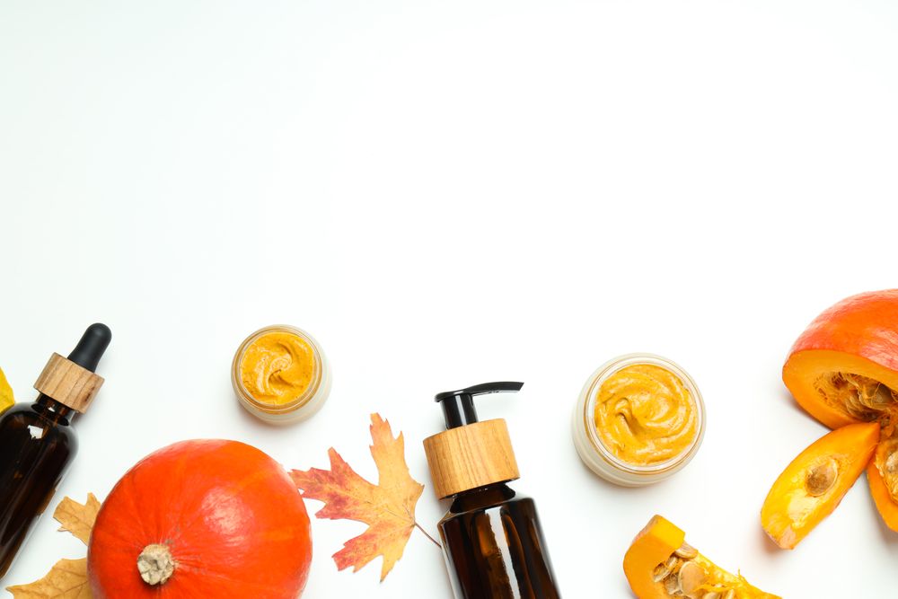Concept of different cosmetic products, Pumpkin cosmetics, space for text