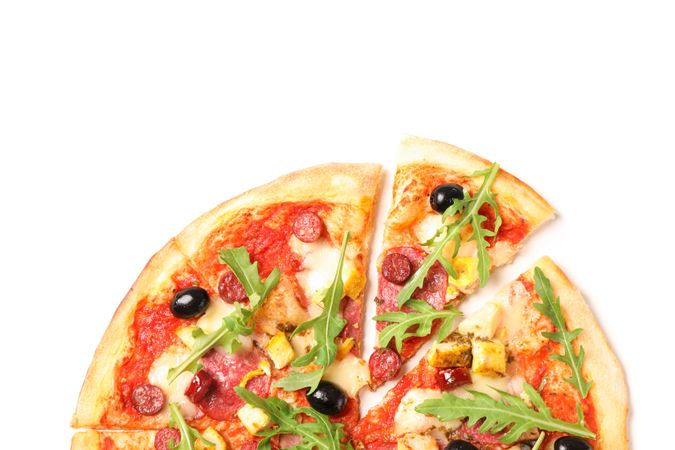 Meat pizza with arugula isolated on blank background, top view
