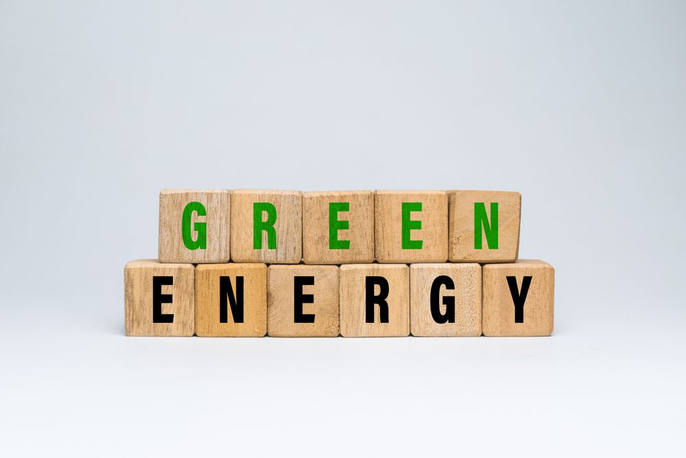 green energy words text on wooden blocks