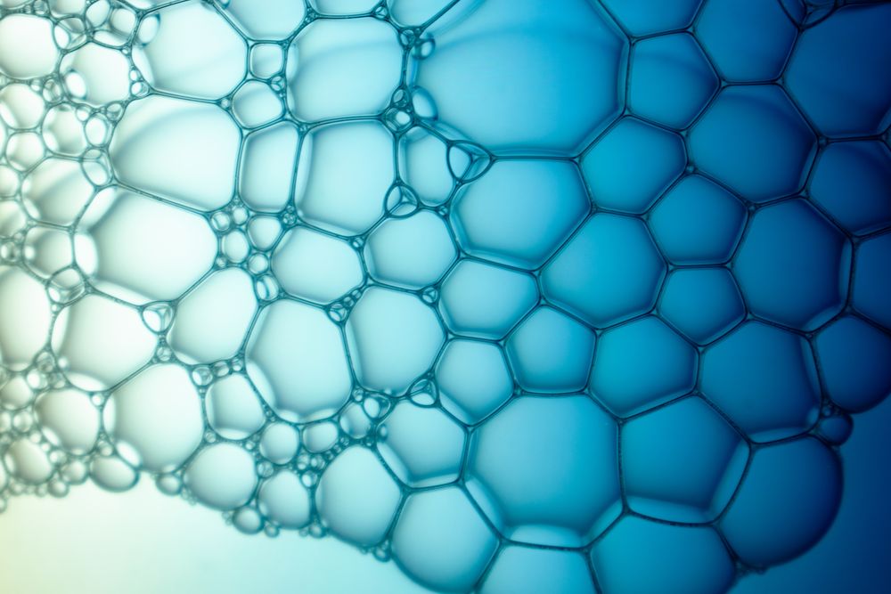 Abstract background bio technology, macro photography foam and water with gradient background. Molecule multicolor backgorund