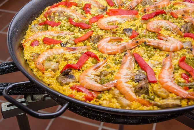 Detail of traditional spanish paella cooked in a pan