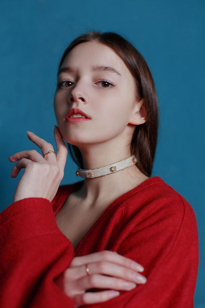 Portrait of woman wearing red shirt