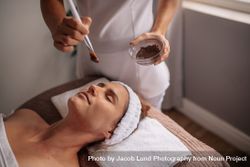 Woman having spa procedure on her face 56Gx8Y