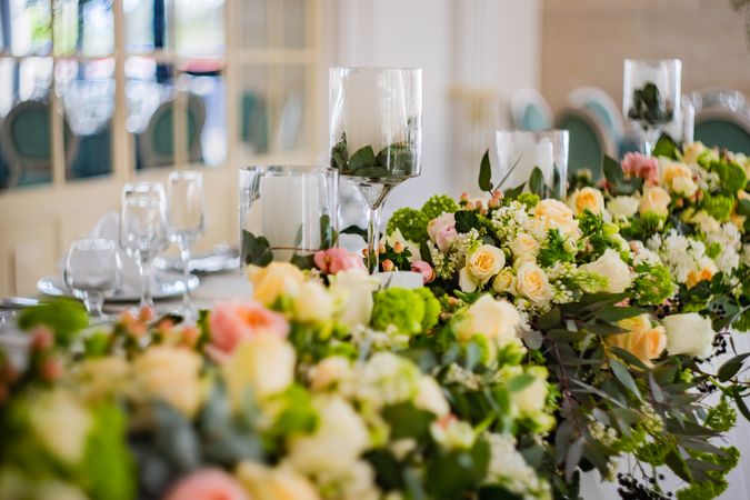 Wedding floral arrangement on long table