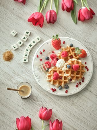 Waffles near inscription and coffee