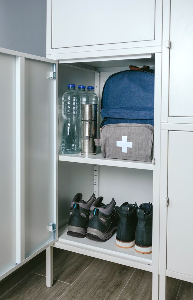 Emergency backpack and first aid kit kept in a closet