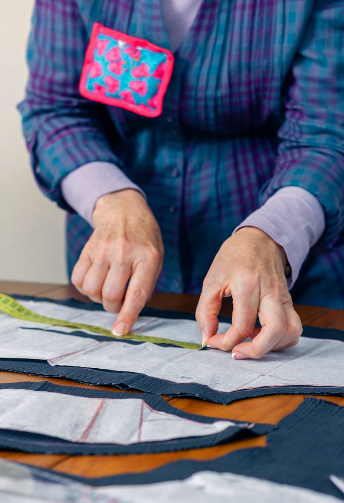 Dressmaker design tailor pattern on the table