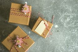 Christmas gifts on counter with label and ornaments