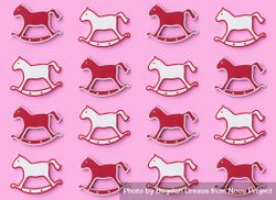 Rocking horse ornaments on pink background 5pQ6O4