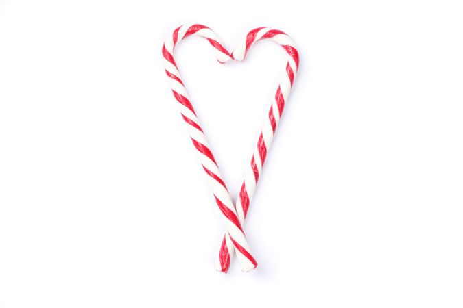 Sweet candy canes isolated on blank background