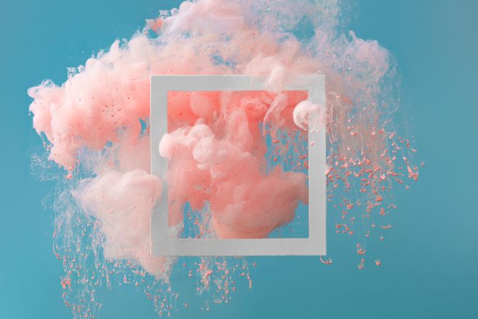 Cloud-like pink color paint with  light frame on blue background