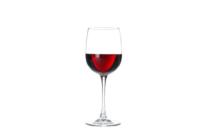 Glass of red wine isolated on plain background