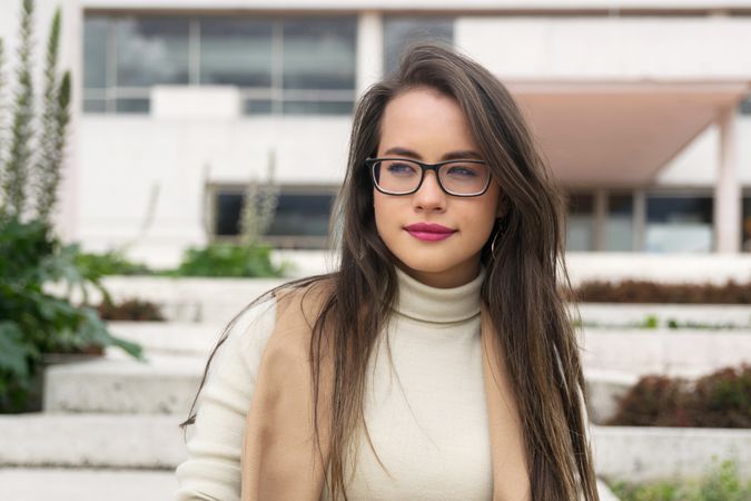 Woman in glasses looking away