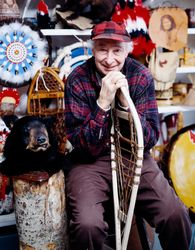 Treffle Bolduc poses with the snowshoes he makes by hand, North Conway, New Hampshire K4jW3b