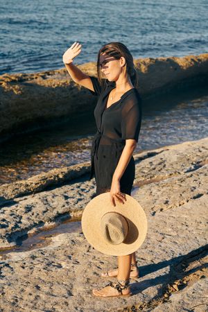 woman enjoying sun on beach