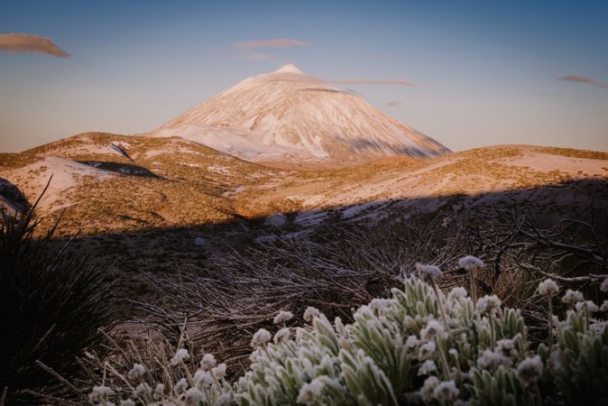 Clouds near snowy mountain