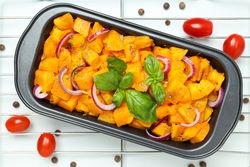 Concept of tasty homemade dish - baked pumpkin