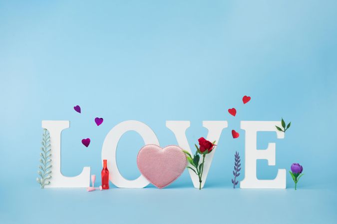 “Love” word on blue background