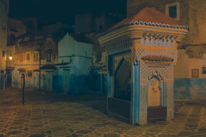 Old narrow street of town at night