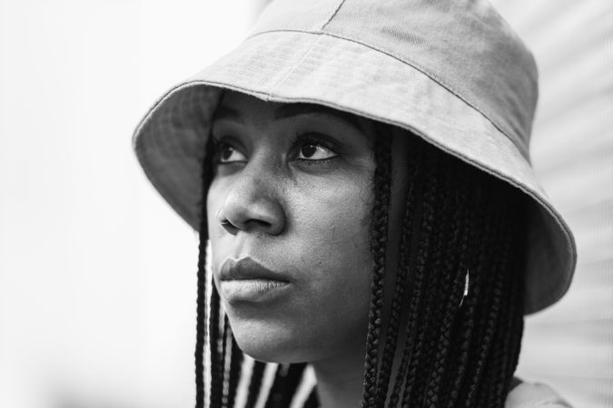 Young Black woman in hat