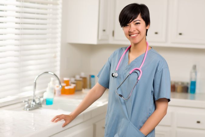 Smiling Doctor or Nurse in An Office