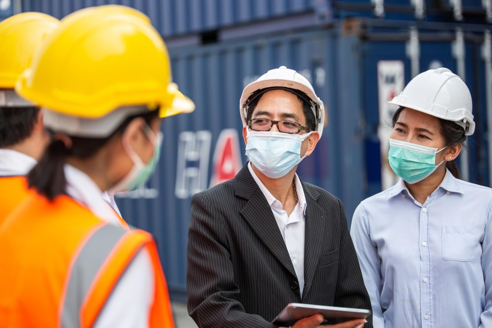 Management visiting workers onsite