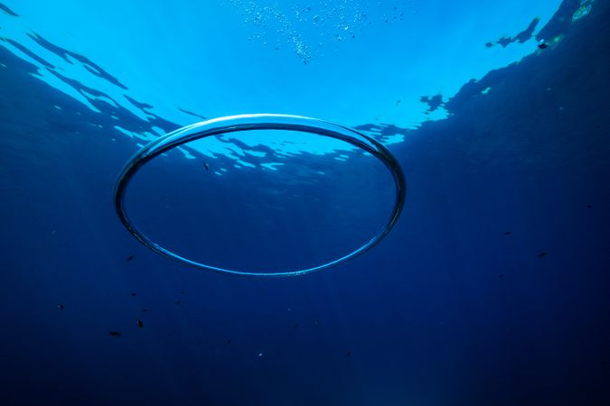 Ring shaped toroidal bubble under blue sea water