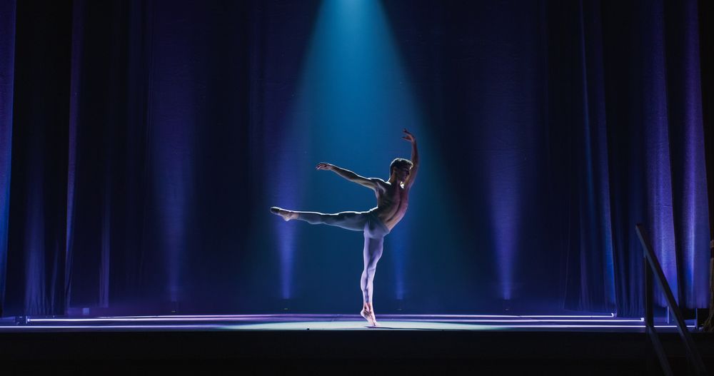 Athletic Man Dancing and Rehearsing his Choreography for the Show