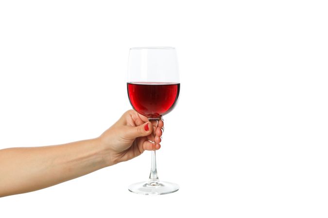 Female hand hold glass with wine, isolated on blank background