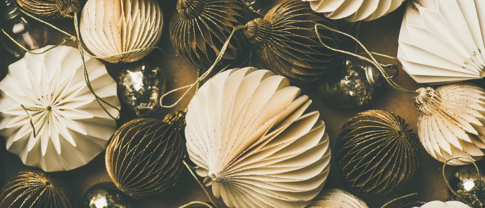Gold and cream folded tree ornaments, and baubles, wide composition