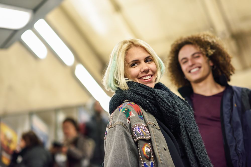 Couple in underground station, London